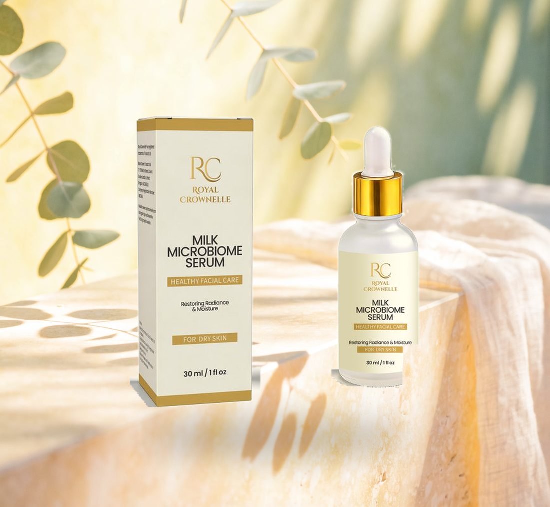 Milk Microbiome Serum for dry skin, bottle and carton on a sunlit stone ledge